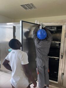Servicing commercial morgue fridge